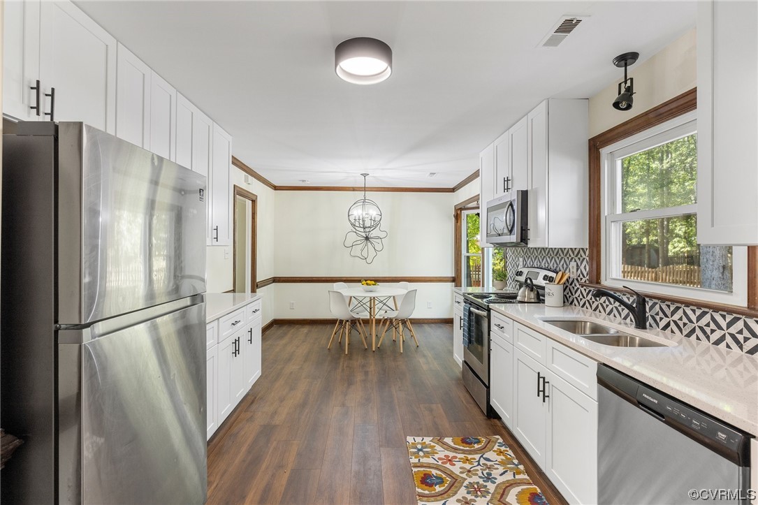 6940 Manning Road Chesterfield, VA 23832 - Photo 9 of 29 Kitchen with sink, dark hardwood flooring, white c
