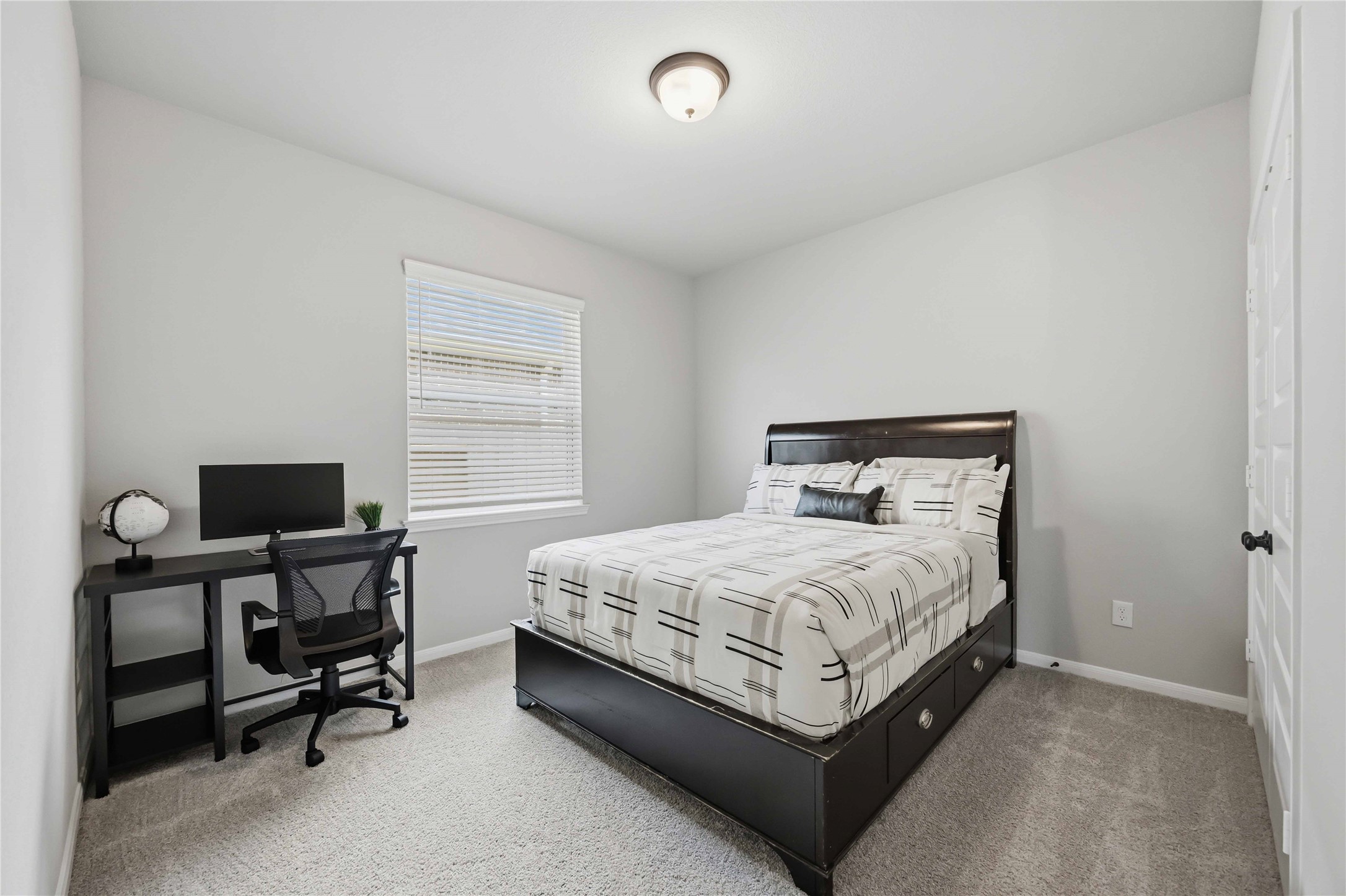 2808 Bisbee Road League City, TX 77573 - Photo 7 of 42 Bedroom 3- Grey Carpet & Black Finishes