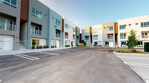 a view of a building with a street