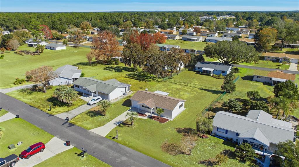 10949 Southwest 79th Terrace Ocala, FL 34476 - Photo 18 of 18 an aerial view of residential houses with outdoor space
