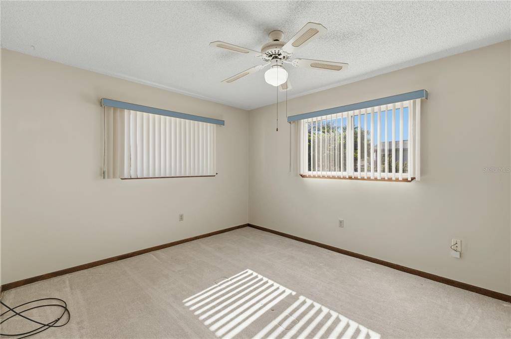 10949 Southwest 79th Terrace Ocala, FL 34476 - Photo 10 of 18 a view of an empty room with a window