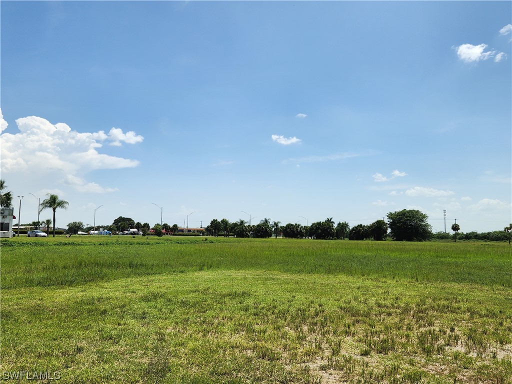 27 10th Street Venus, FL 33960 - Photo 2 of 5 a view of a golf course with a lake