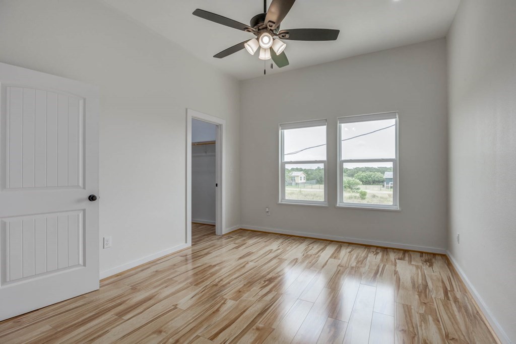13 Bayview Loop Rockport, TX 78382 - Photo 17 of 26 a view of a room with wooden floor and windows