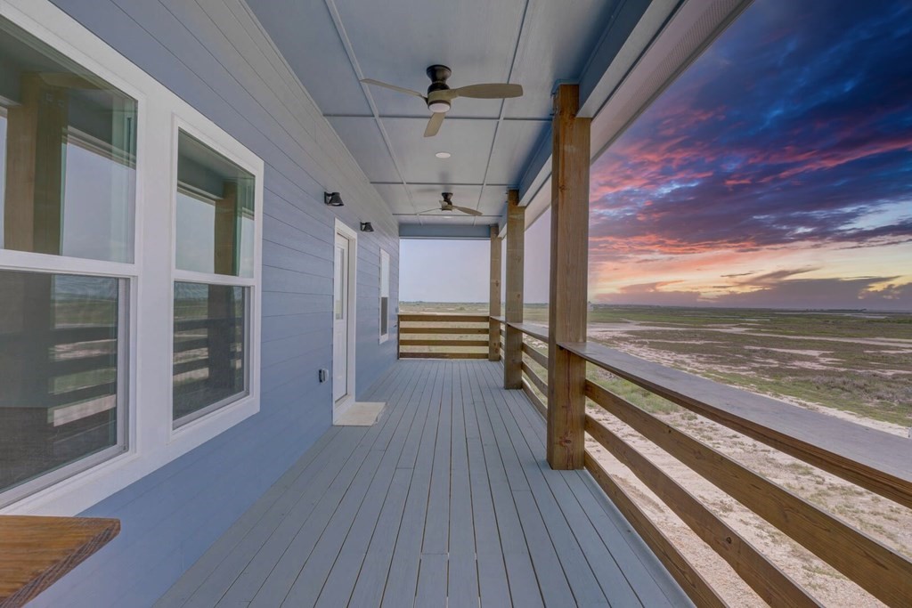 13 Bayview Loop Rockport, TX 78382 - Photo 4 of 26 a view of outdoor space with wooden floor and stairs