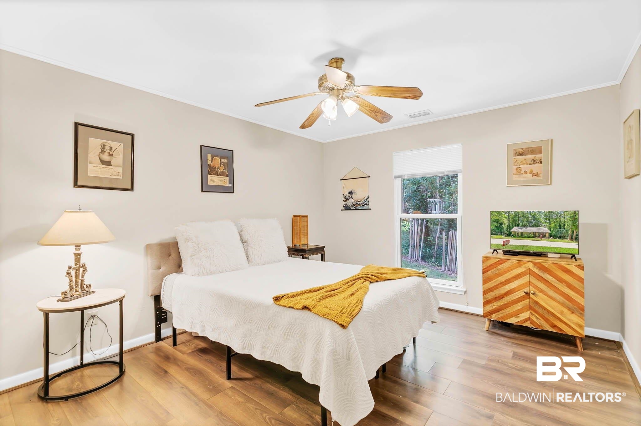 332 Ridgewood Drive Daphne, AL 36526 - Photo 19 of 48 Bedroom with ornamental molding, wood finished floors, and a ceiling fan
