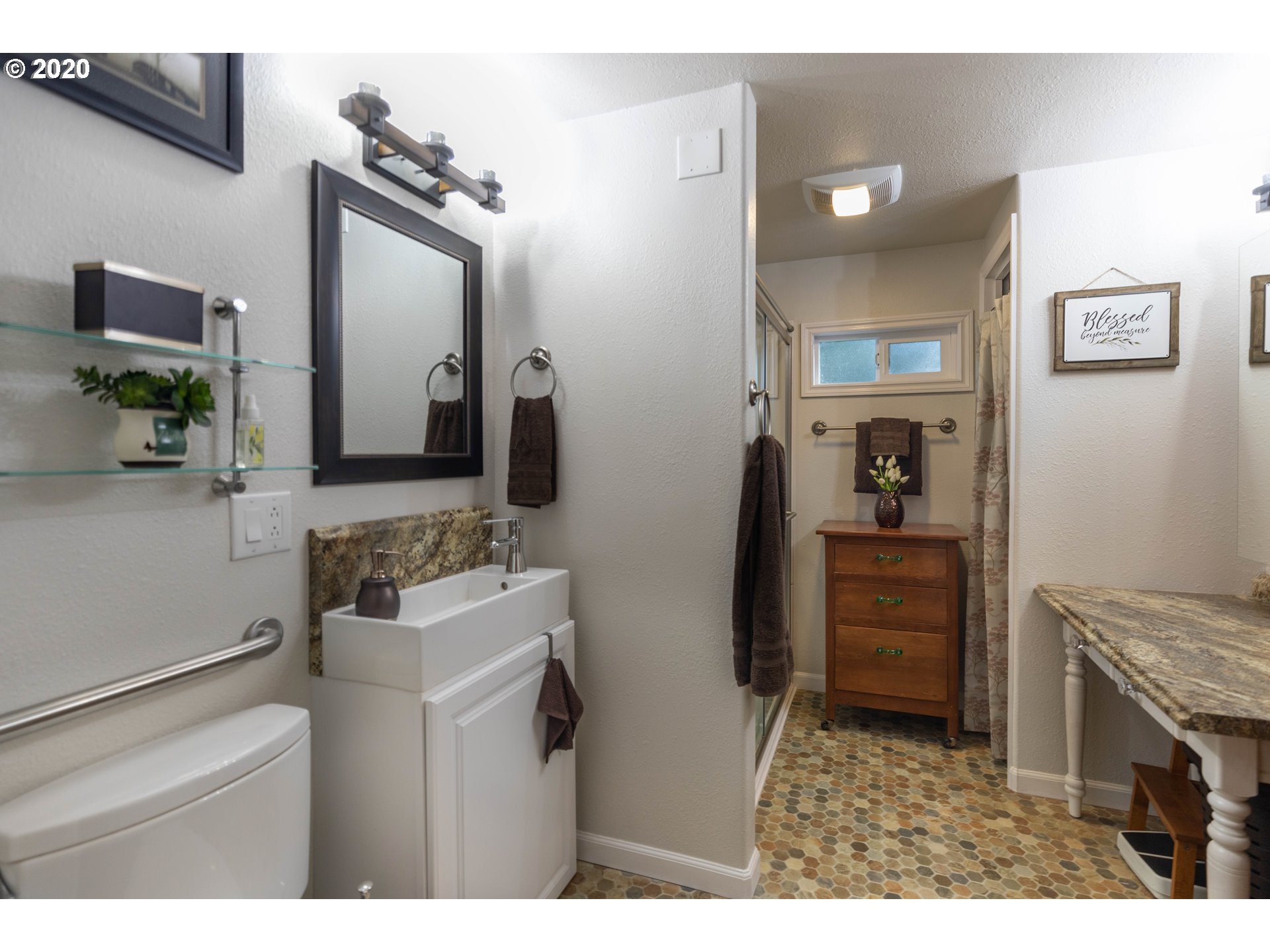 32487 Southeast Colorado Road Sandy, OR 97055 - Photo 12 of 31 a bathroom with a sink and a mirror