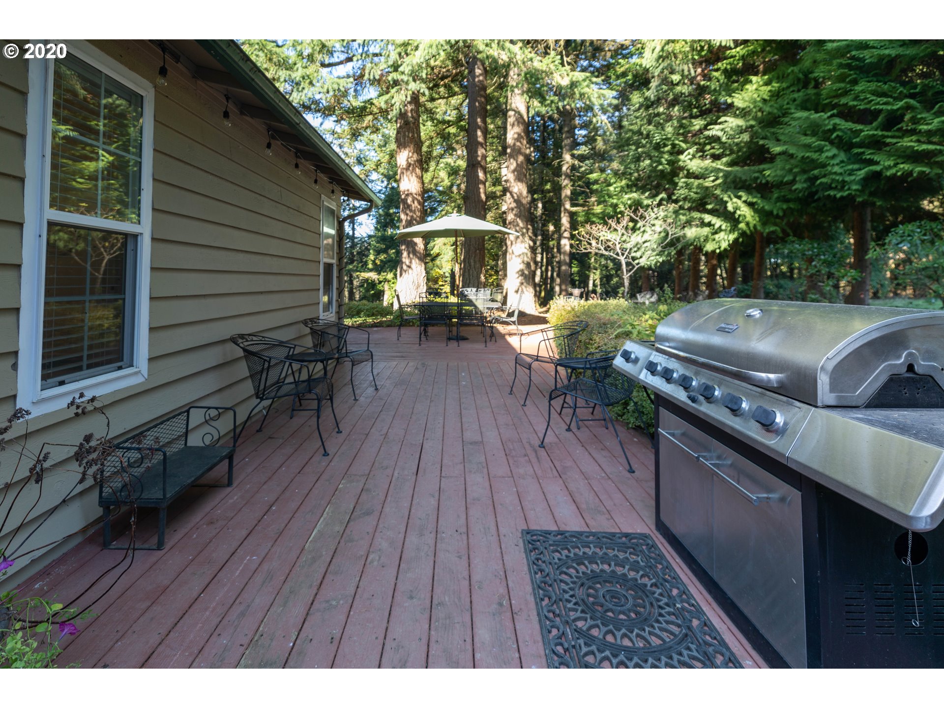 32487 Southeast Colorado Road Sandy, OR 97055 - Photo 19 of 31 a terrace with outdoor seating and wooden floor