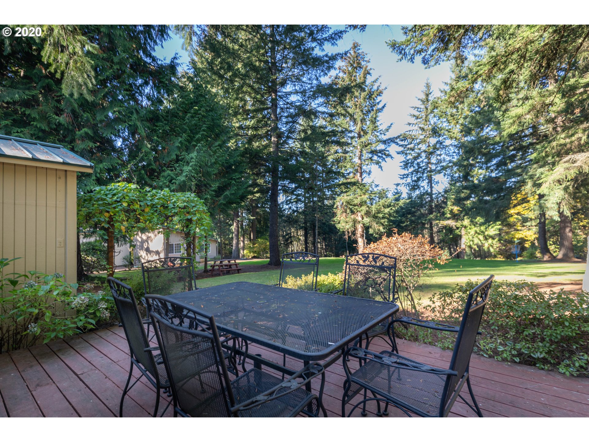 32487 Southeast Colorado Road Sandy, OR 97055 - Photo 20 of 31 a view of a table and chairs in patio of the house
