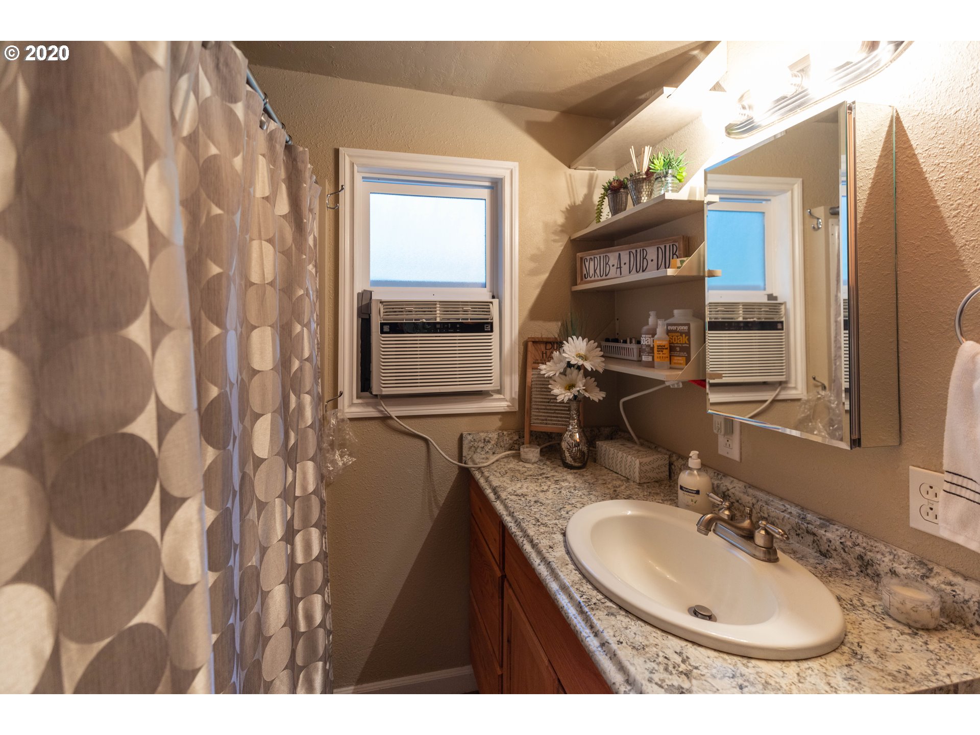 32487 Southeast Colorado Road Sandy, OR 97055 - Photo 26 of 31 a bathroom with a sink and a mirror