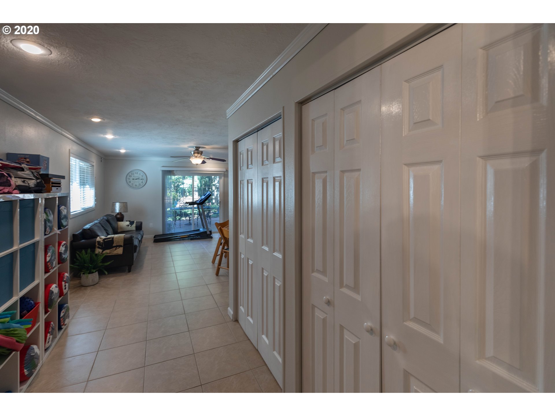 32487 Southeast Colorado Road Sandy, OR 97055 - Photo 8 of 31 a view of a hallway with livingroom and furniture