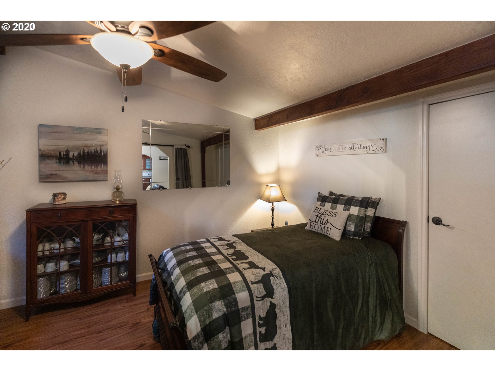 32487 Southeast Colorado Road Sandy, OR 97055 - Photo 10 of 31 a bedroom with bed and window