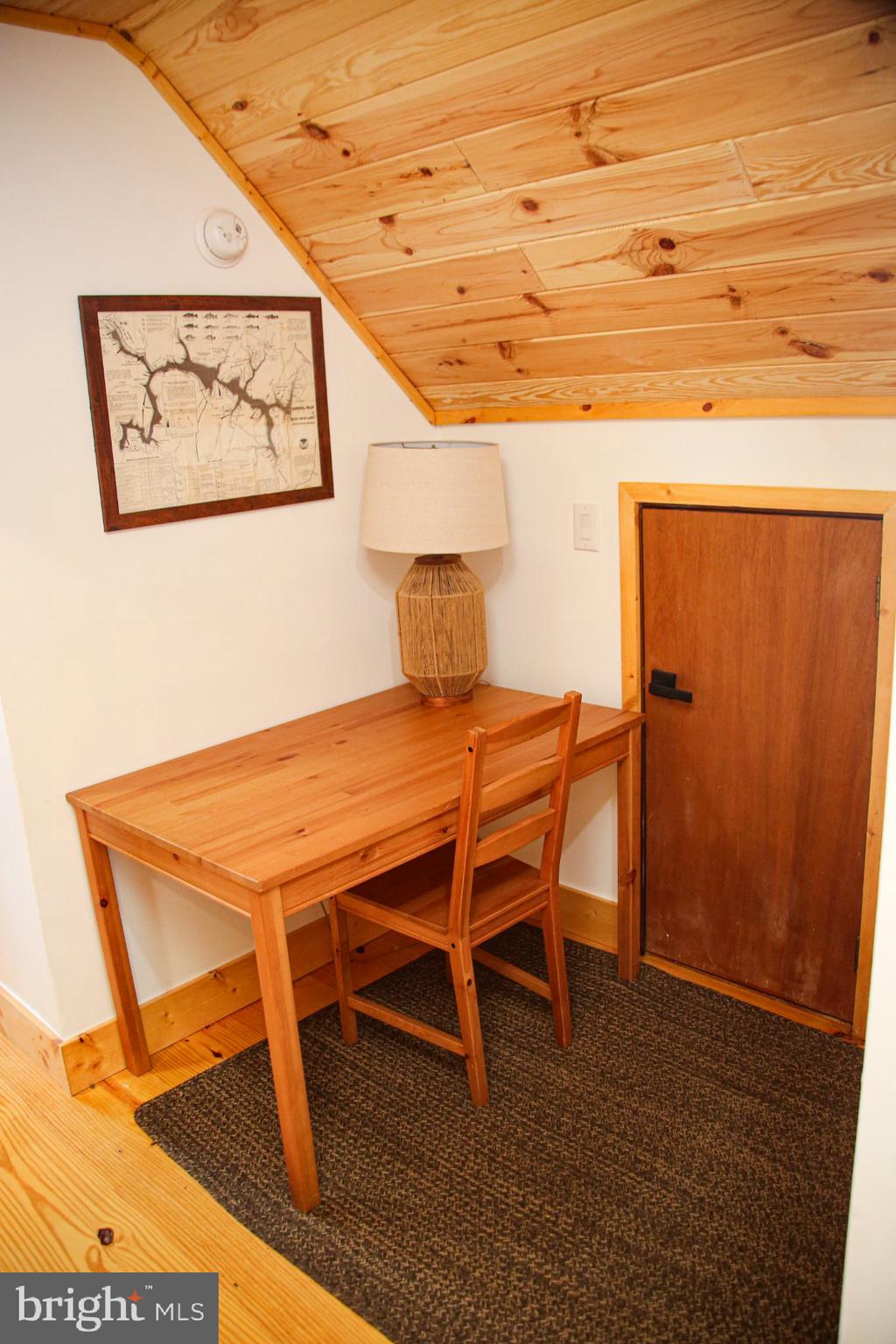120 Rock Lodge Road McHenry, MD 21541 - Photo 13 of 23 a dining room with a table and chairs