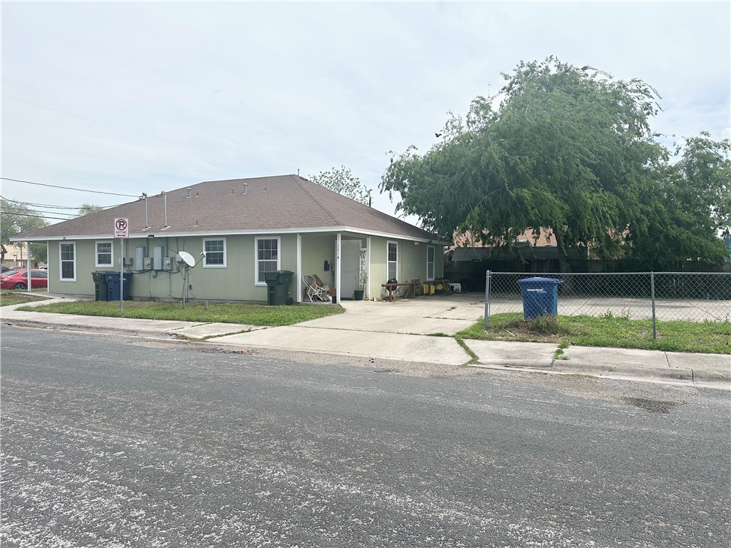 201 Edwards Street Corpus Christi, TX 78404 - Photo 9 of 10 a house with trees in the background