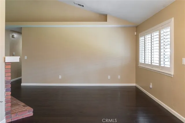 an aerial view of houses with street