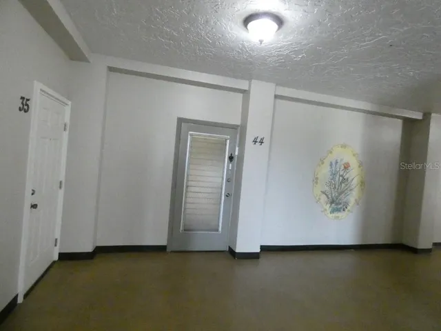 an empty room with window