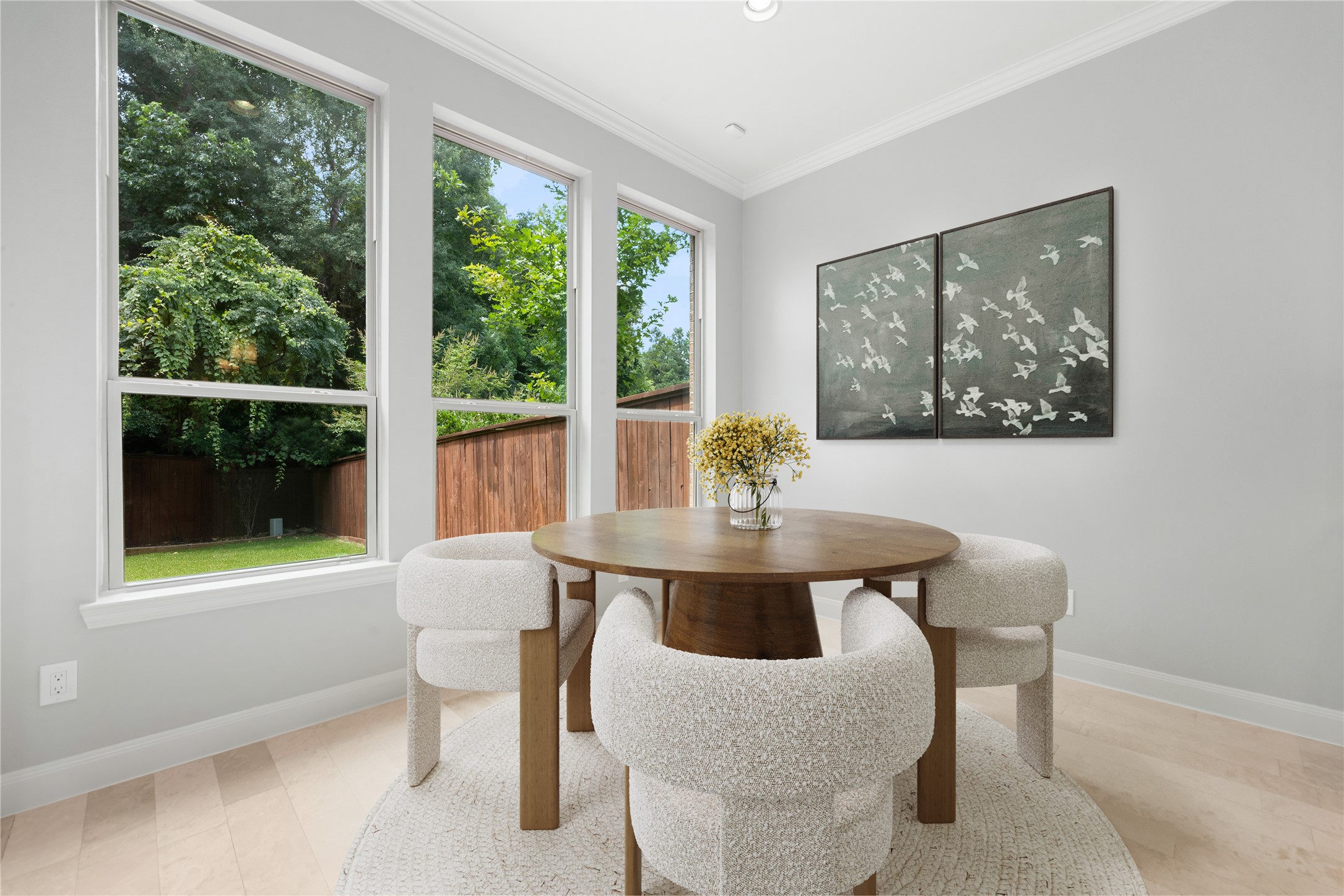 98 Herons Flight Place Spring, TX 77389 - Photo 11 of 29 Sunlit breakfast area surrounded by oversized windows overlooking the private, fenced backyard, perfect for casual dining. *Virtually Staged