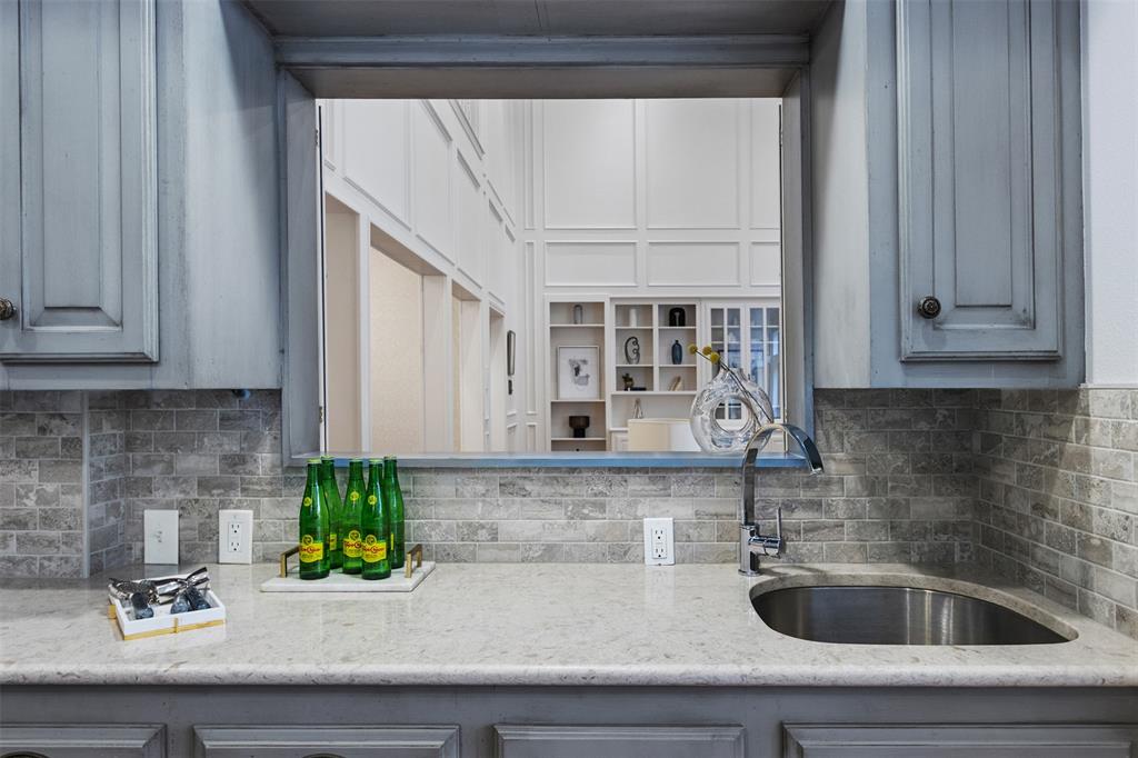 7 Queensview Court Dallas, TX 75225 - Photo 19 of 40 a kitchen with a sink and cabinets