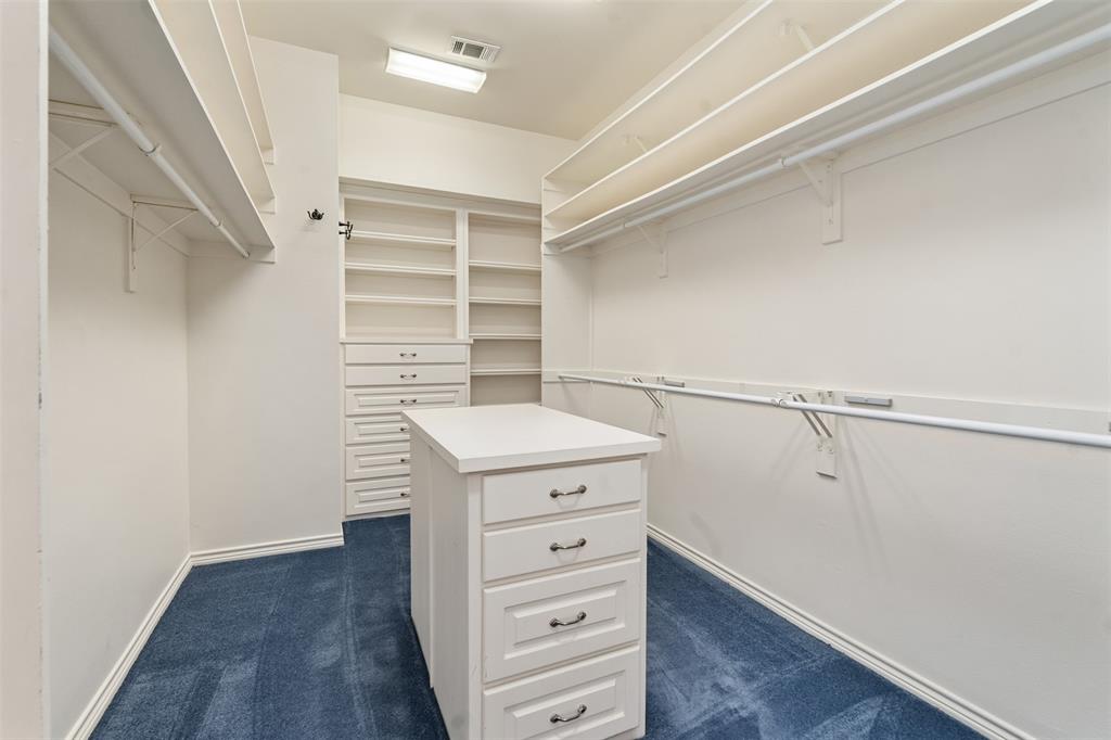 7 Queensview Court Dallas, TX 75225 - Photo 31 of 40 a kitchen with a wooden floor and white walls