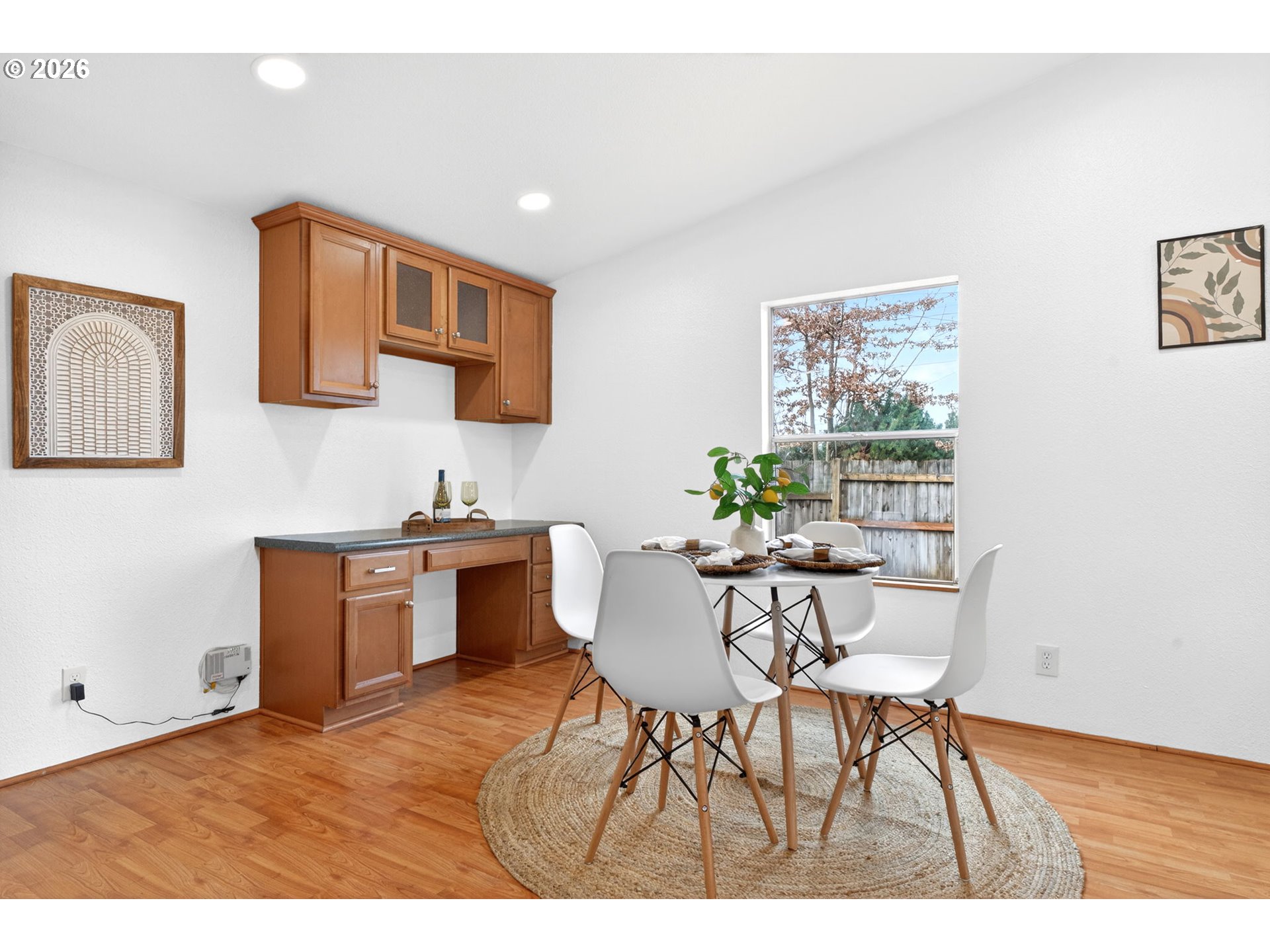 110 South Harrison Street Newberg, OR 97132 - Photo 12 of 41 a view of a dining room with furniture and wooden floor
