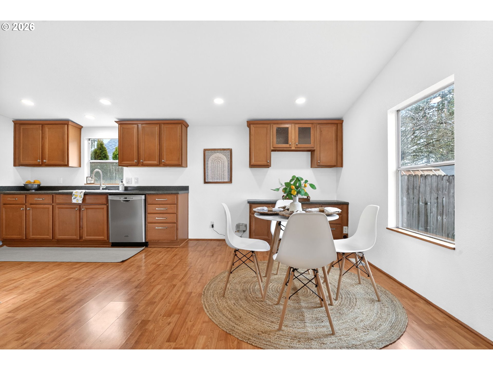110 South Harrison Street Newberg, OR 97132 - Photo 13 of 41 a view of a dining room with furniture and wooden floor