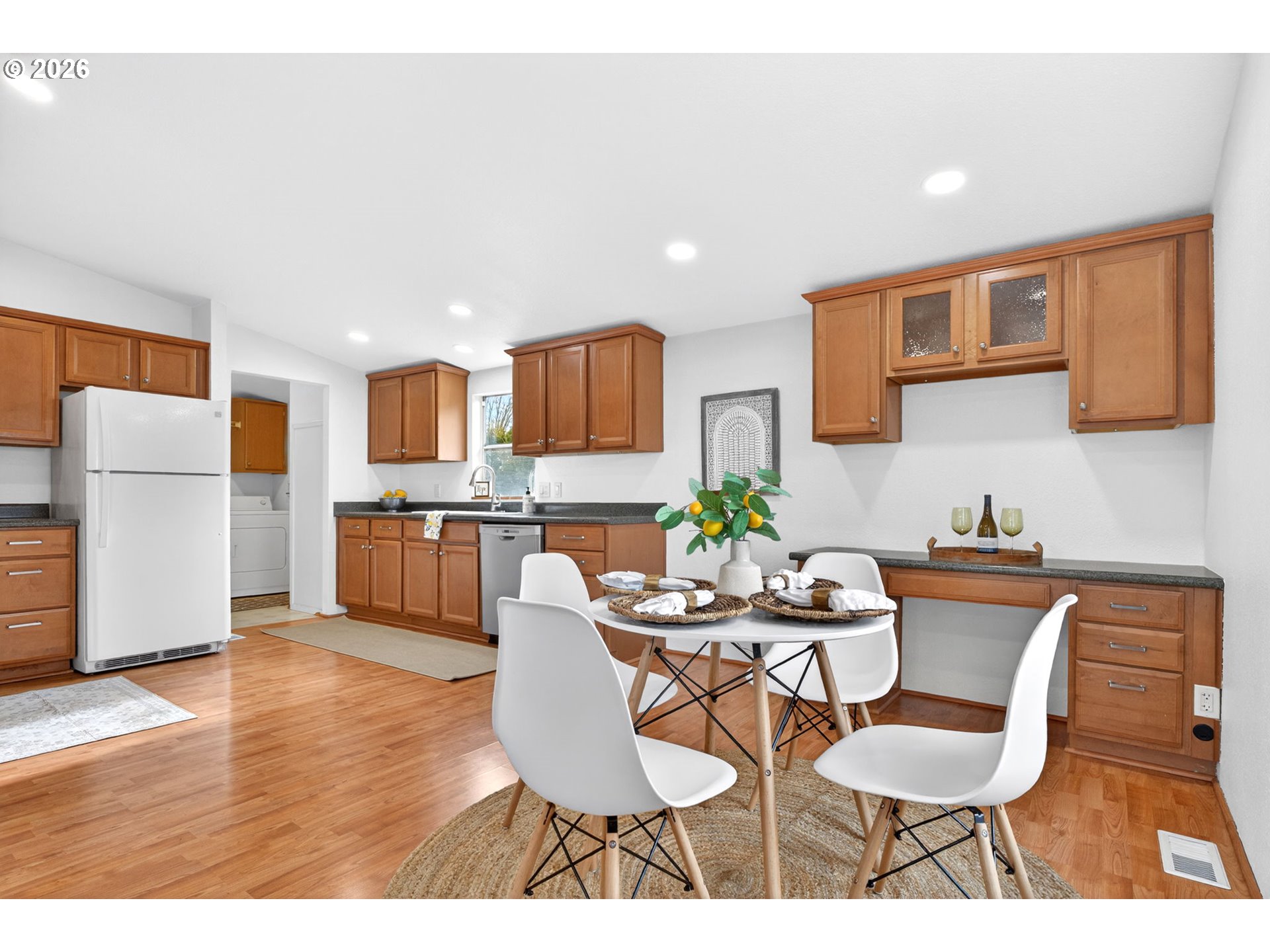 110 South Harrison Street Newberg, OR 97132 - Photo 14 of 41 a dining room with furniture and kitchen view