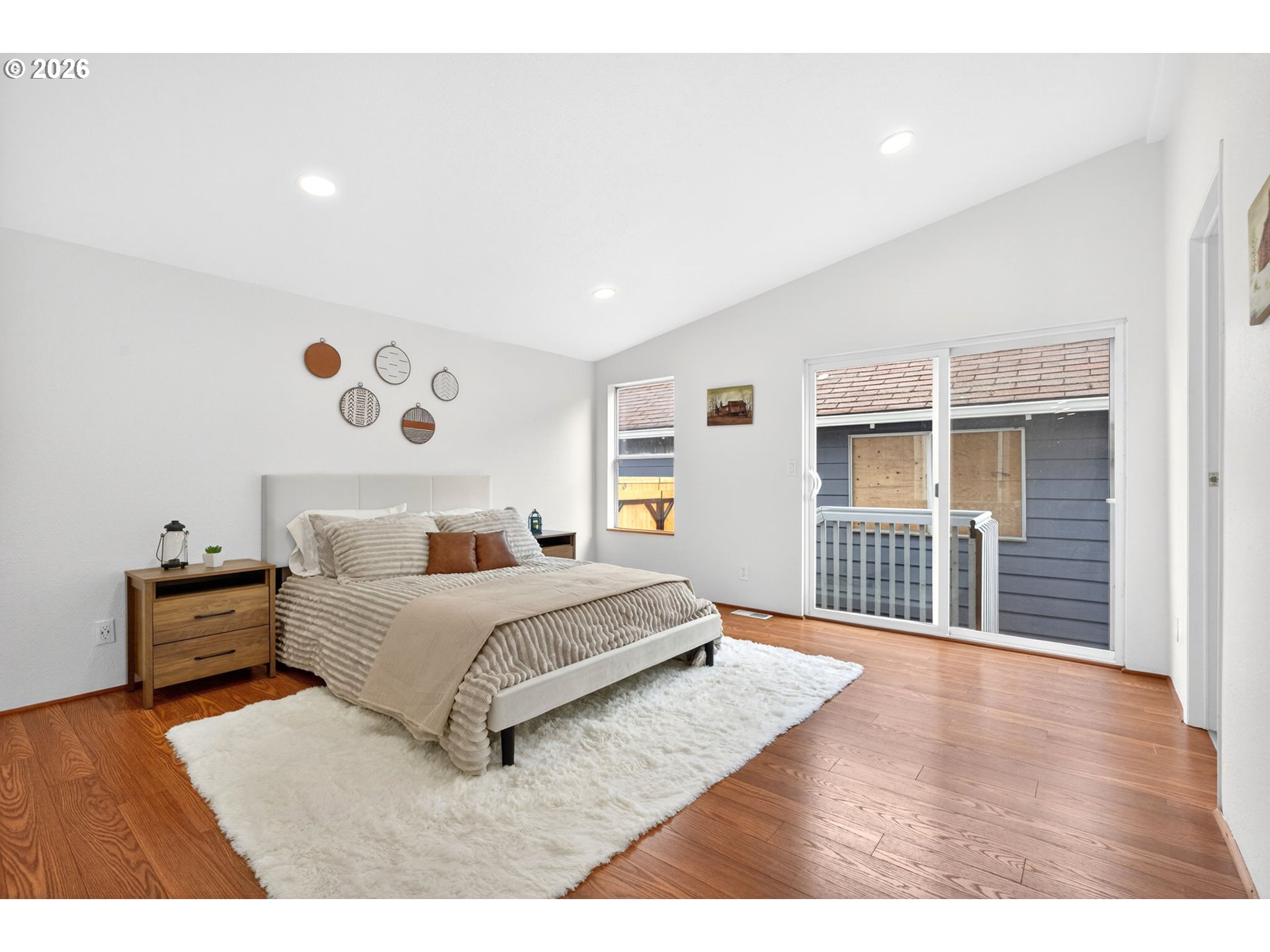110 South Harrison Street Newberg, OR 97132 - Photo 17 of 41 a bedroom with furniture and a window