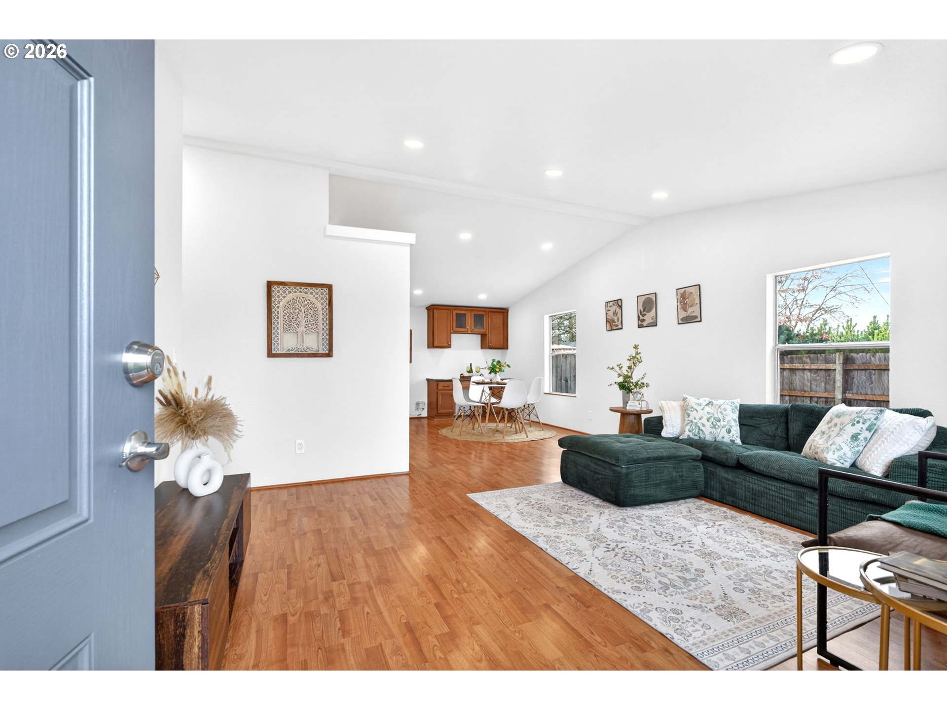 110 South Harrison Street Newberg, OR 97132 - Photo 2 of 41 a living room with furniture and wooden floor
