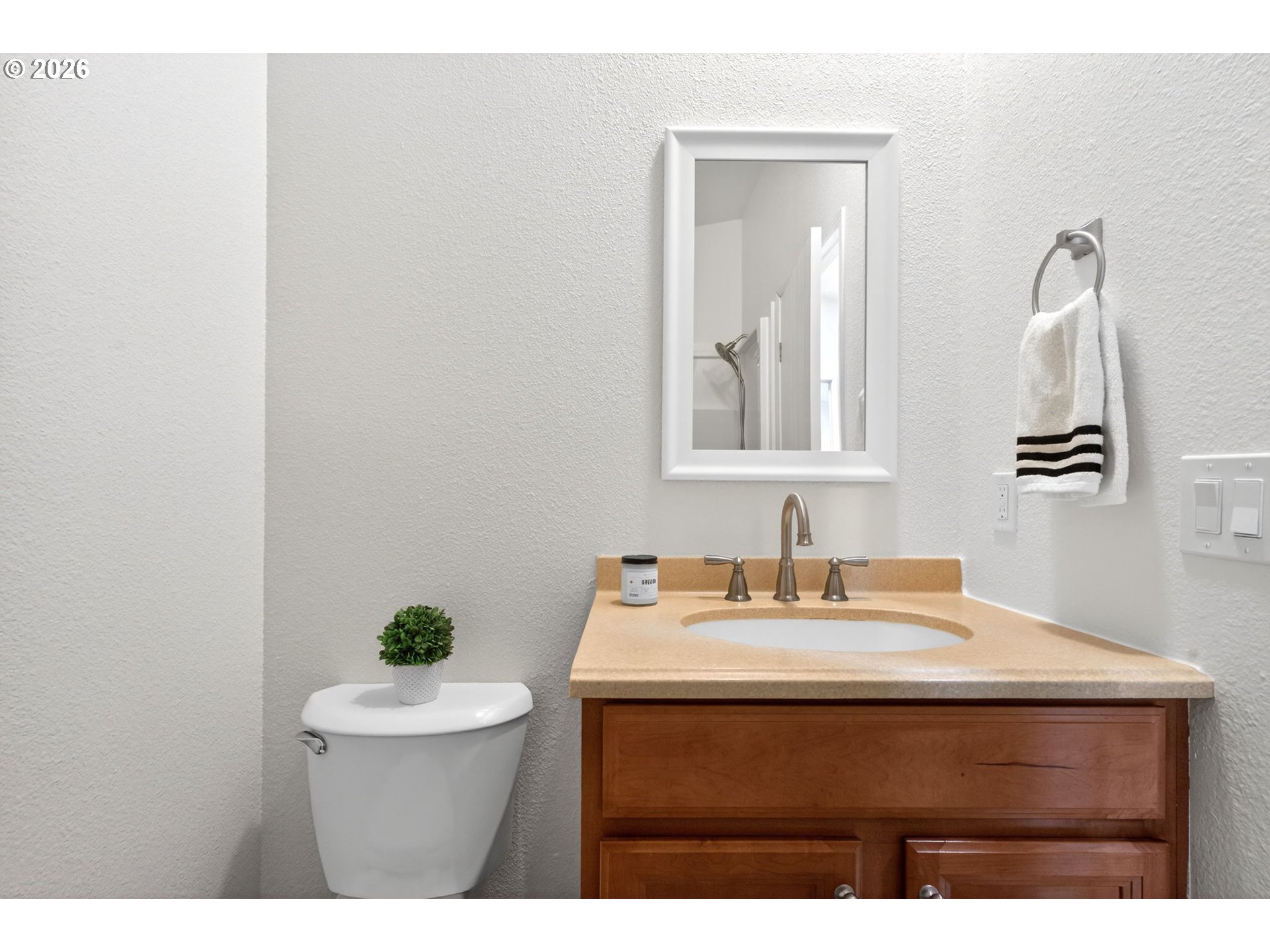 110 South Harrison Street Newberg, OR 97132 - Photo 27 of 41 a bathroom with a sink and a mirror