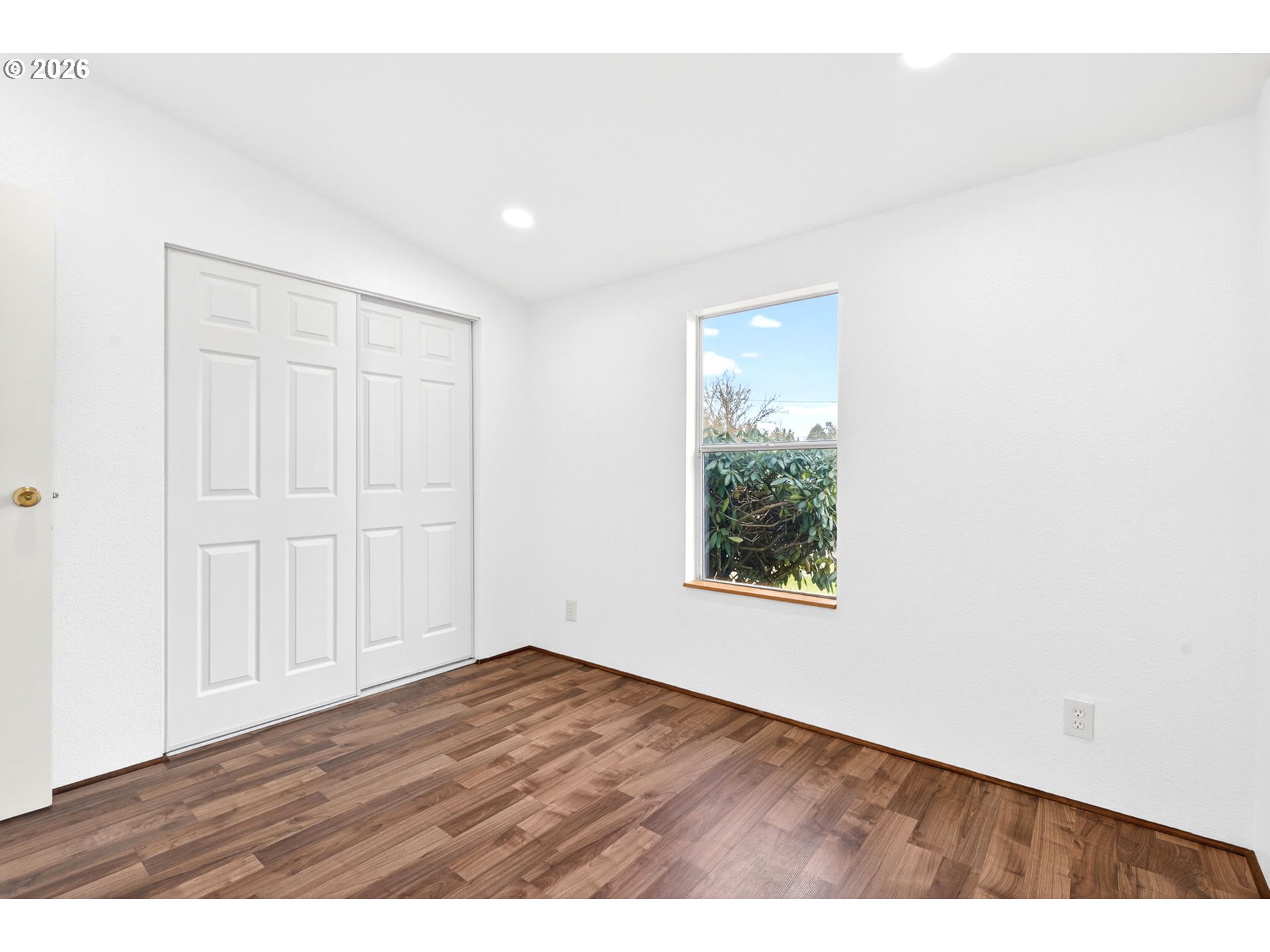 110 South Harrison Street Newberg, OR 97132 - Photo 28 of 41 a view of an empty room with wooden floor