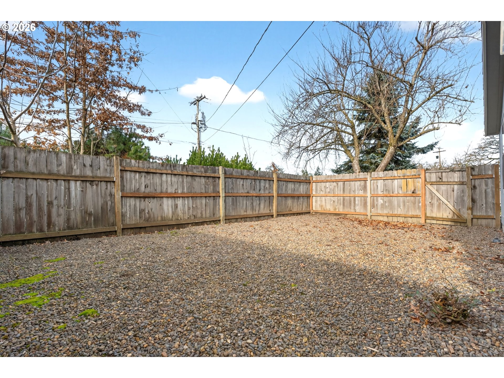 110 South Harrison Street Newberg, OR 97132 - Photo 35 of 41 a view of a backyard with wooden fence