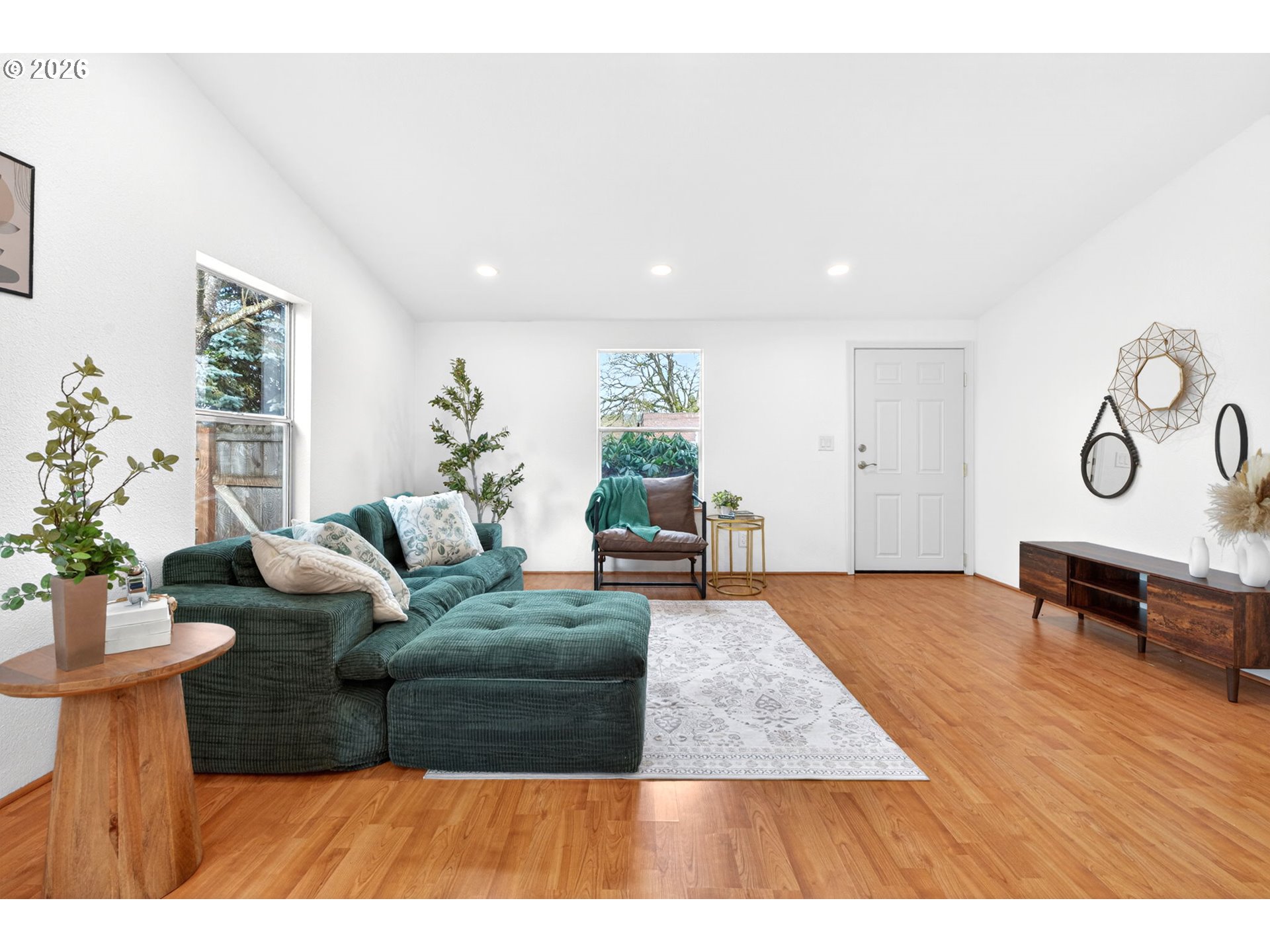 110 South Harrison Street Newberg, OR 97132 - Photo 4 of 41 a living room with furniture and wooden floor