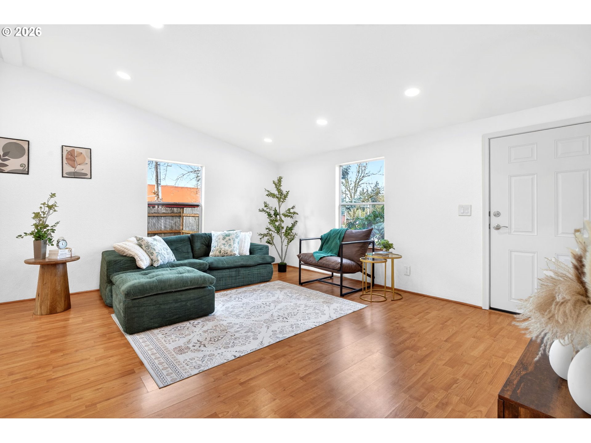 110 South Harrison Street Newberg, OR 97132 - Photo 5 of 41 a living room with furniture and a wooden floor
