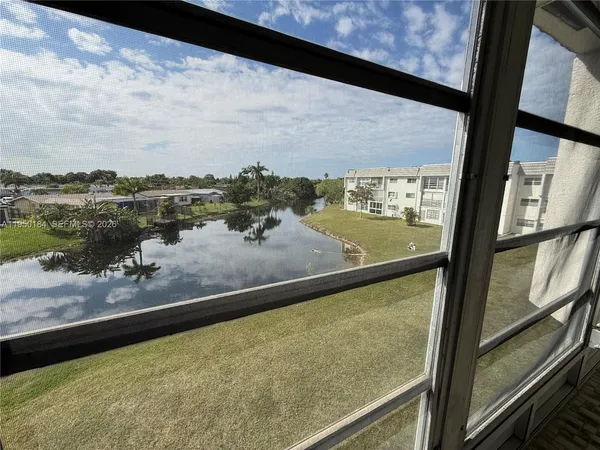 a view of a lake from a window