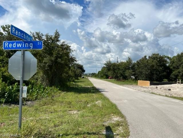 348 Ranchito Avenue Lehigh Acres, FL 33974 - Photo 4 of 4 a sign board with a yard