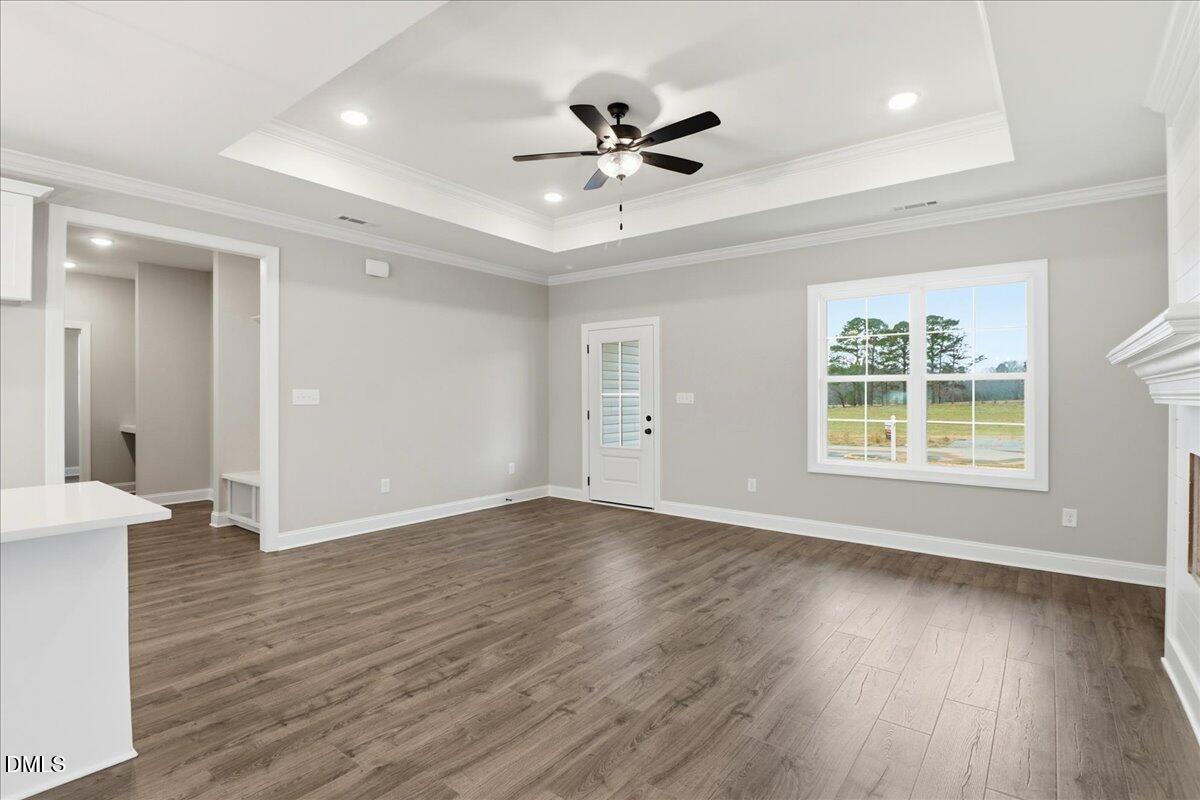 1381 Scarlet Oak Rd Spring Spring Hope, NC 27882 - Photo 15 of 23 a view of an empty room with wooden floor and a window