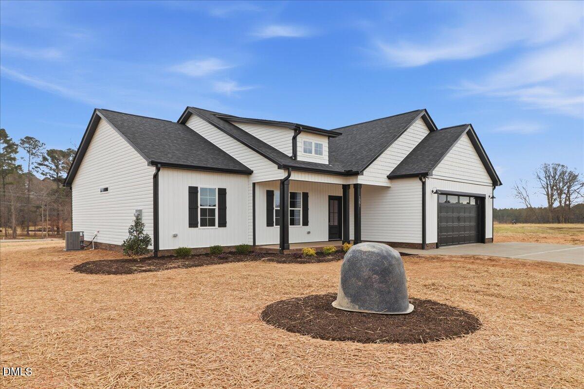 1381 Scarlet Oak Rd Spring Spring Hope, NC 27882 - Photo 2 of 23 a front view of a house with a porch