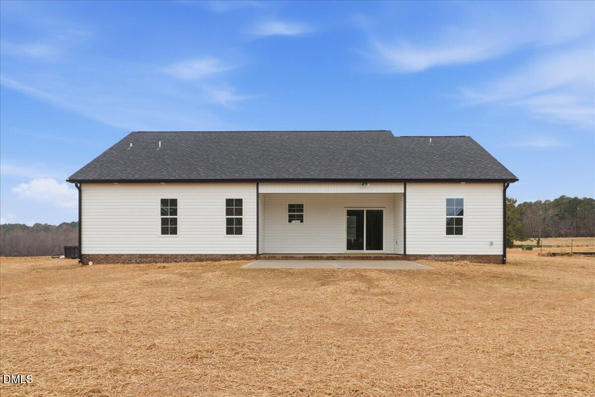 1381 Scarlet Oak Rd Spring Spring Hope, NC 27882 - Photo 4 of 23 a front view of a house with a yard