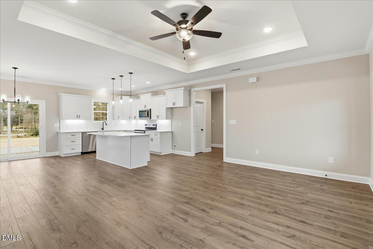 1381 Scarlet Oak Rd Spring Spring Hope, NC 27882 - Photo 7 of 23 a view of kitchen with wooden floor and window