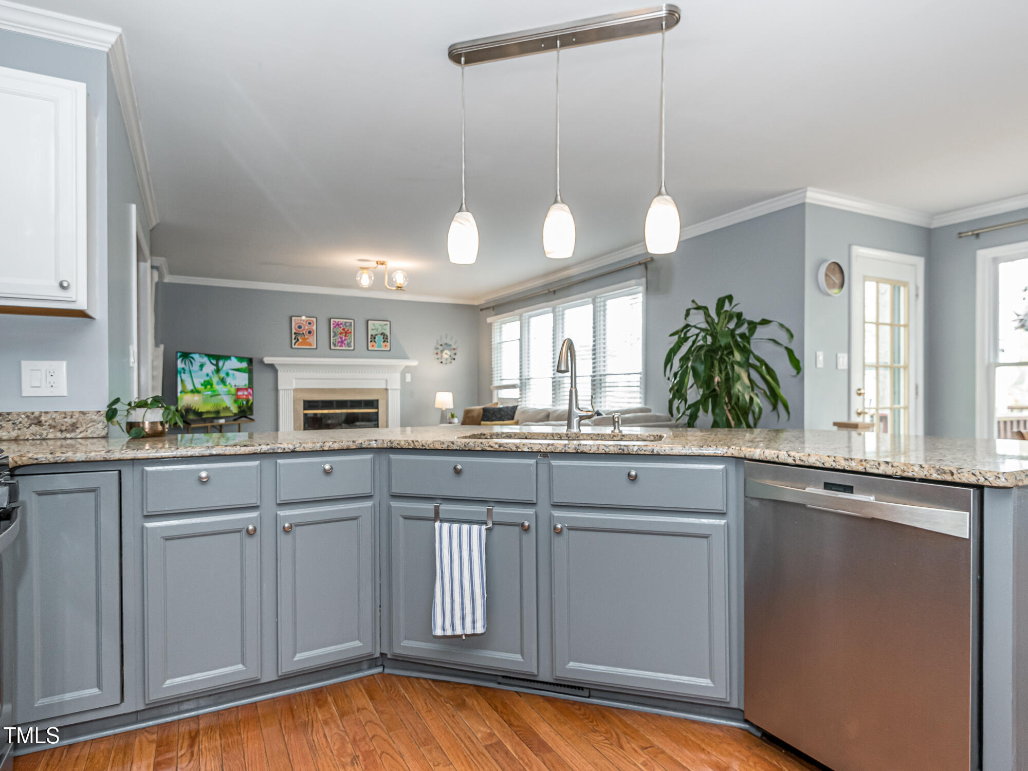 4617 Atterbury Court Raleigh, NC 27604 - Photo 13 of 41 a kitchen with cabinets and window