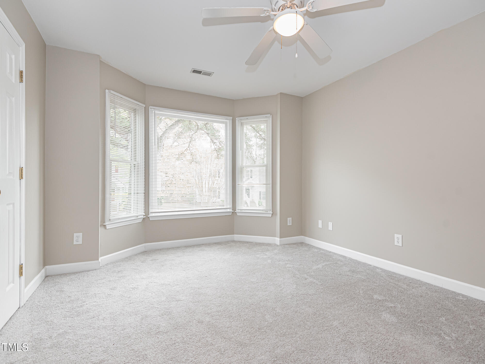 4617 Atterbury Court Raleigh, NC 27604 - Photo 25 of 41 a view of an empty room with a window