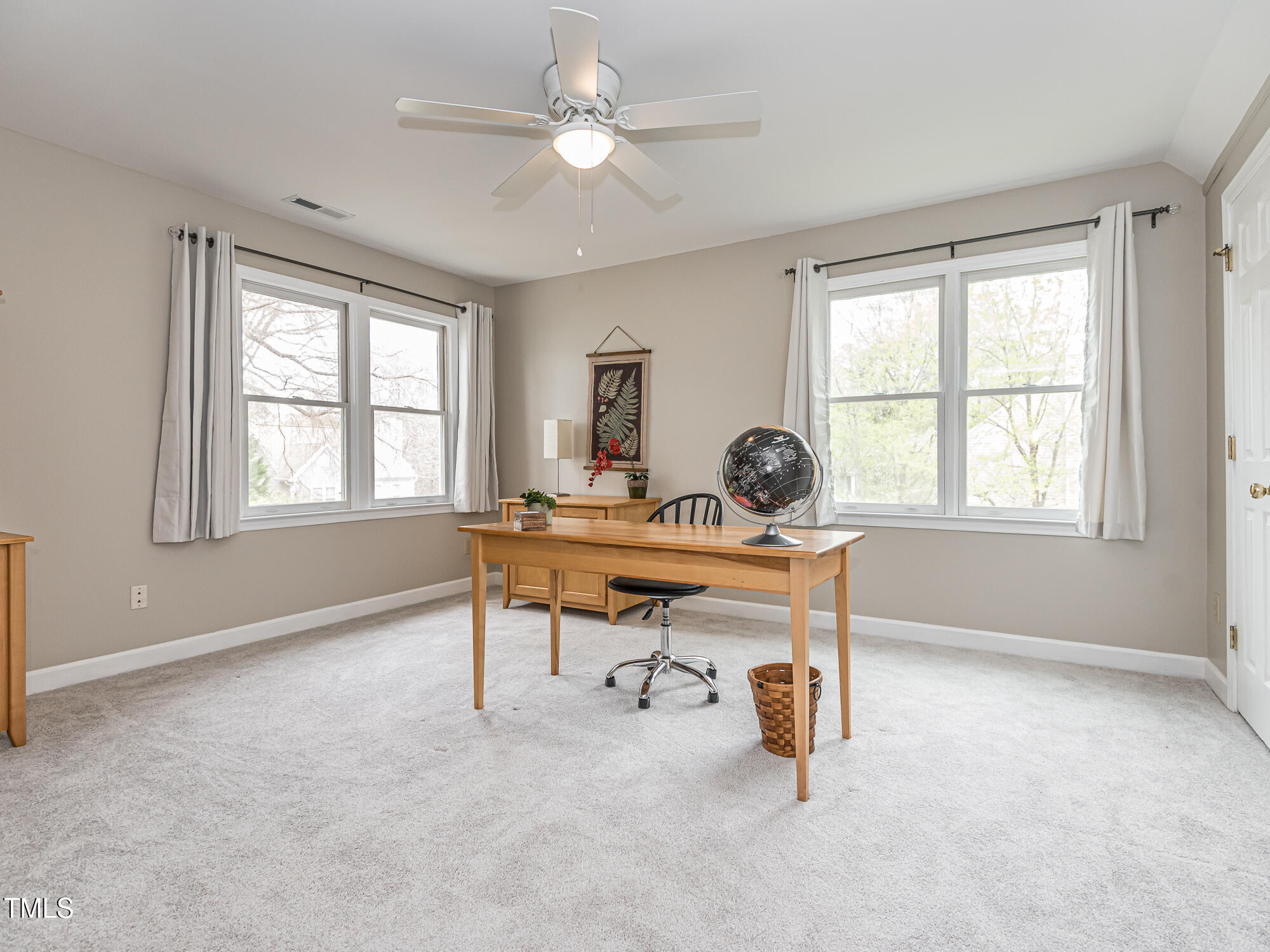 4617 Atterbury Court Raleigh, NC 27604 - Photo 27 of 41 a view of a workspace with furniture and a window
