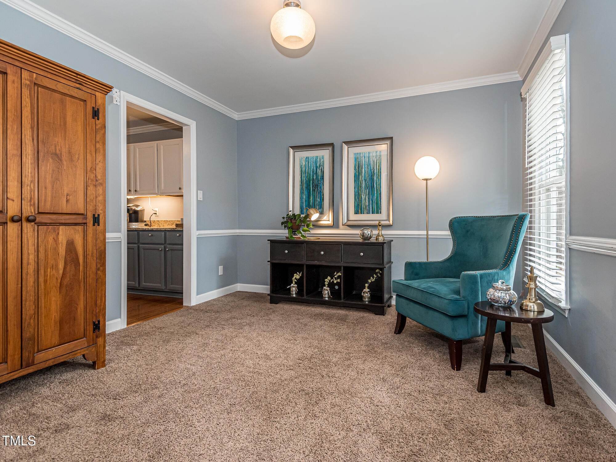 4617 Atterbury Court Raleigh, NC 27604 - Photo 4 of 41 a living room with furniture and a table