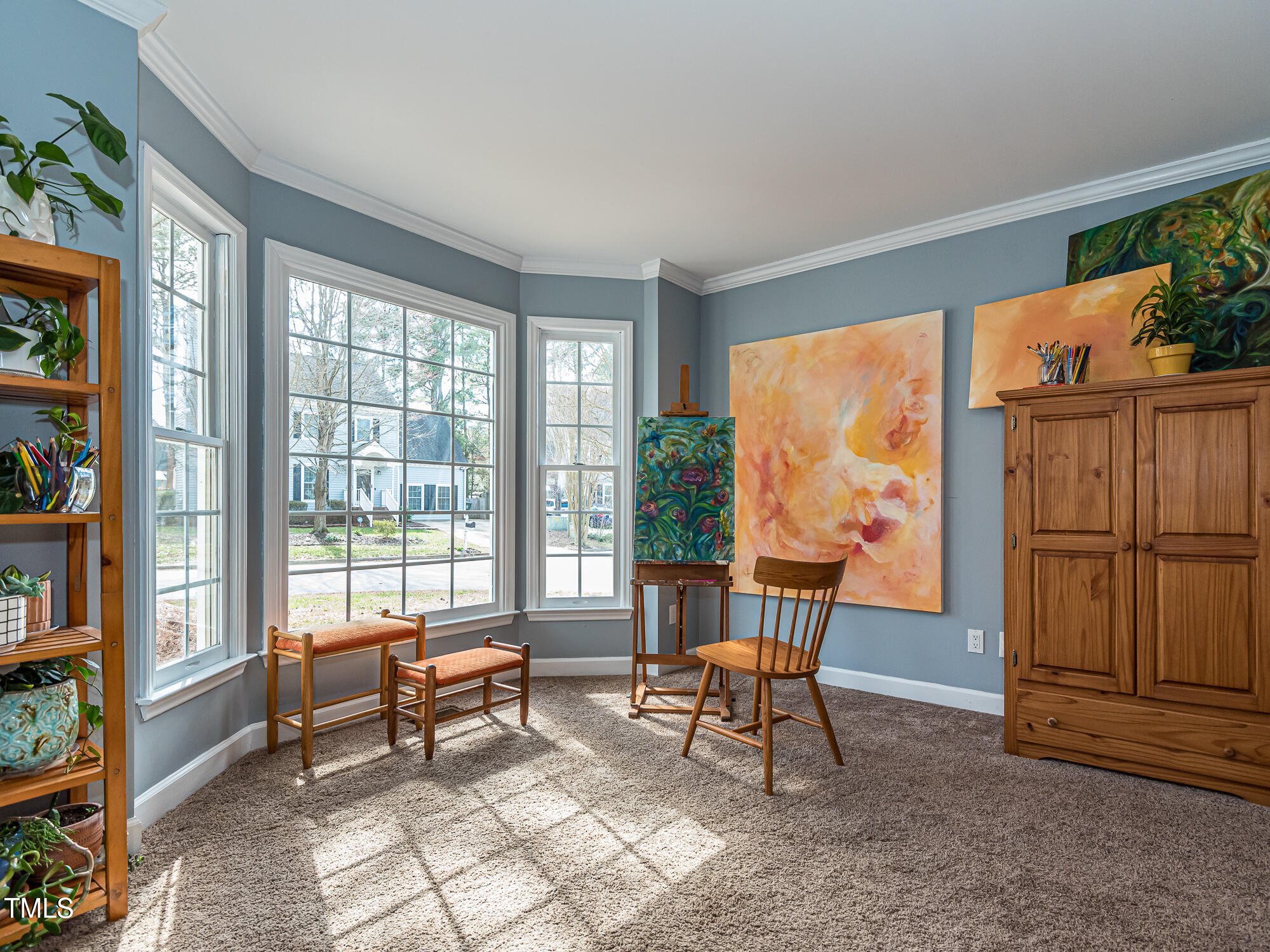 4617 Atterbury Court Raleigh, NC 27604 - Photo 7 of 41 a living room with furniture and a floor to ceiling window