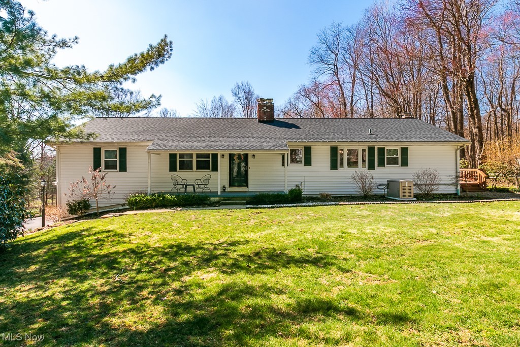 10495 Mulberry Road Chardon, OH 44024 - Photo 1 of 48 Front view of house with new generator and the covered porch.