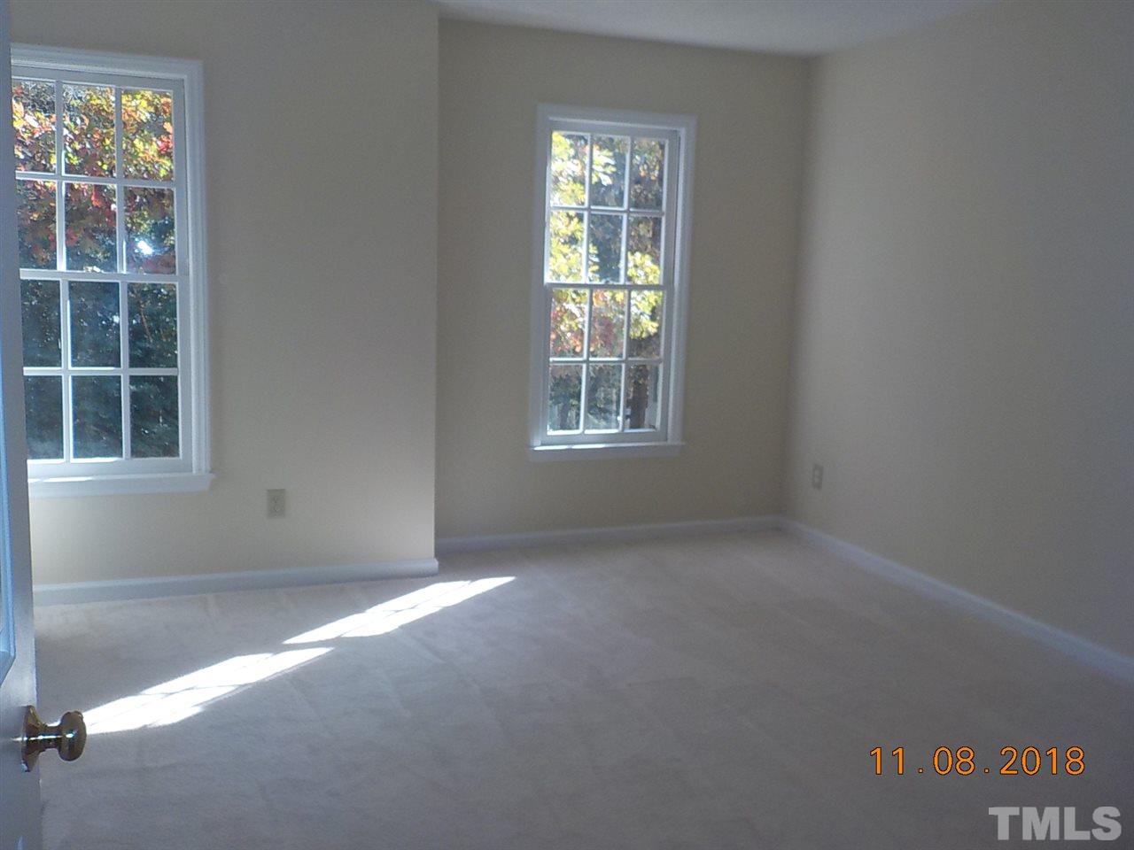 3317 Singleleaf Lane Raleigh, NC 27616 - Photo 12 of 19 an empty room with windows