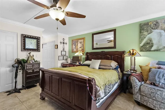 a bedroom with a bed and furniture