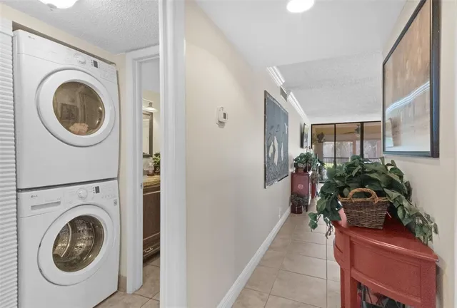 a entryway with a washer and dryer