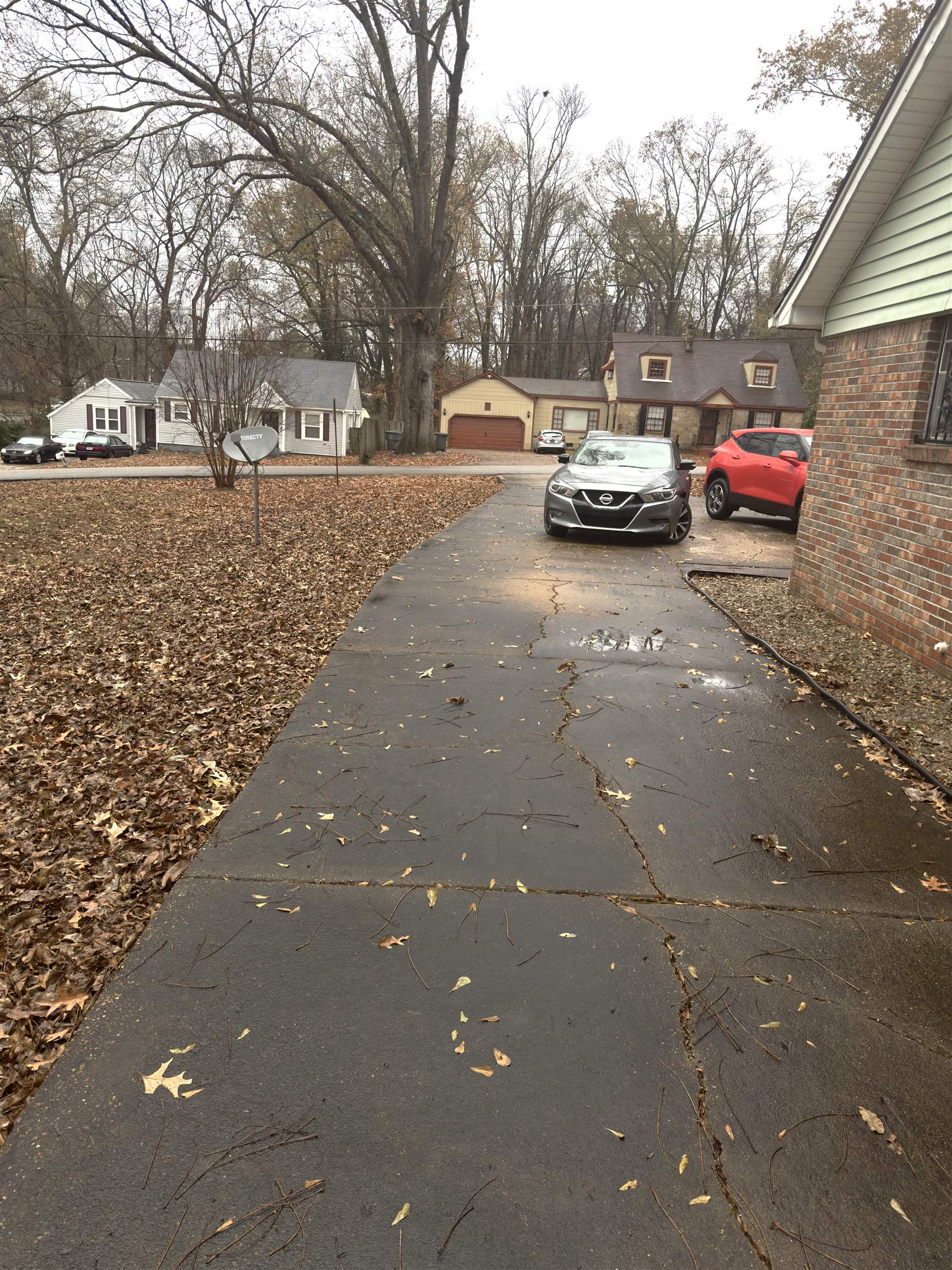 895 Brownlee Road Memphis, TN 38116 - Photo 4 of 6 View of asphalt driveway with a residential view