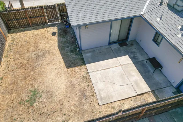 a view of outdoor space with wooden floor