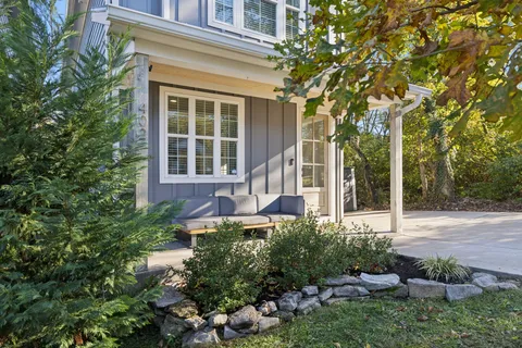 front view of a house with a yard